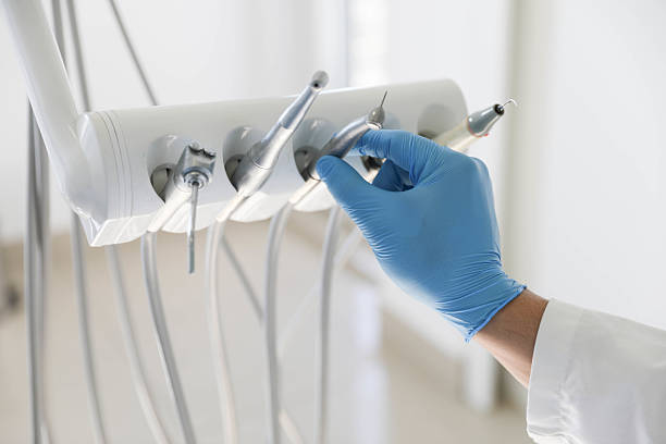 Professional Invisalign Clear Aligners technician working in DeCordova, TX